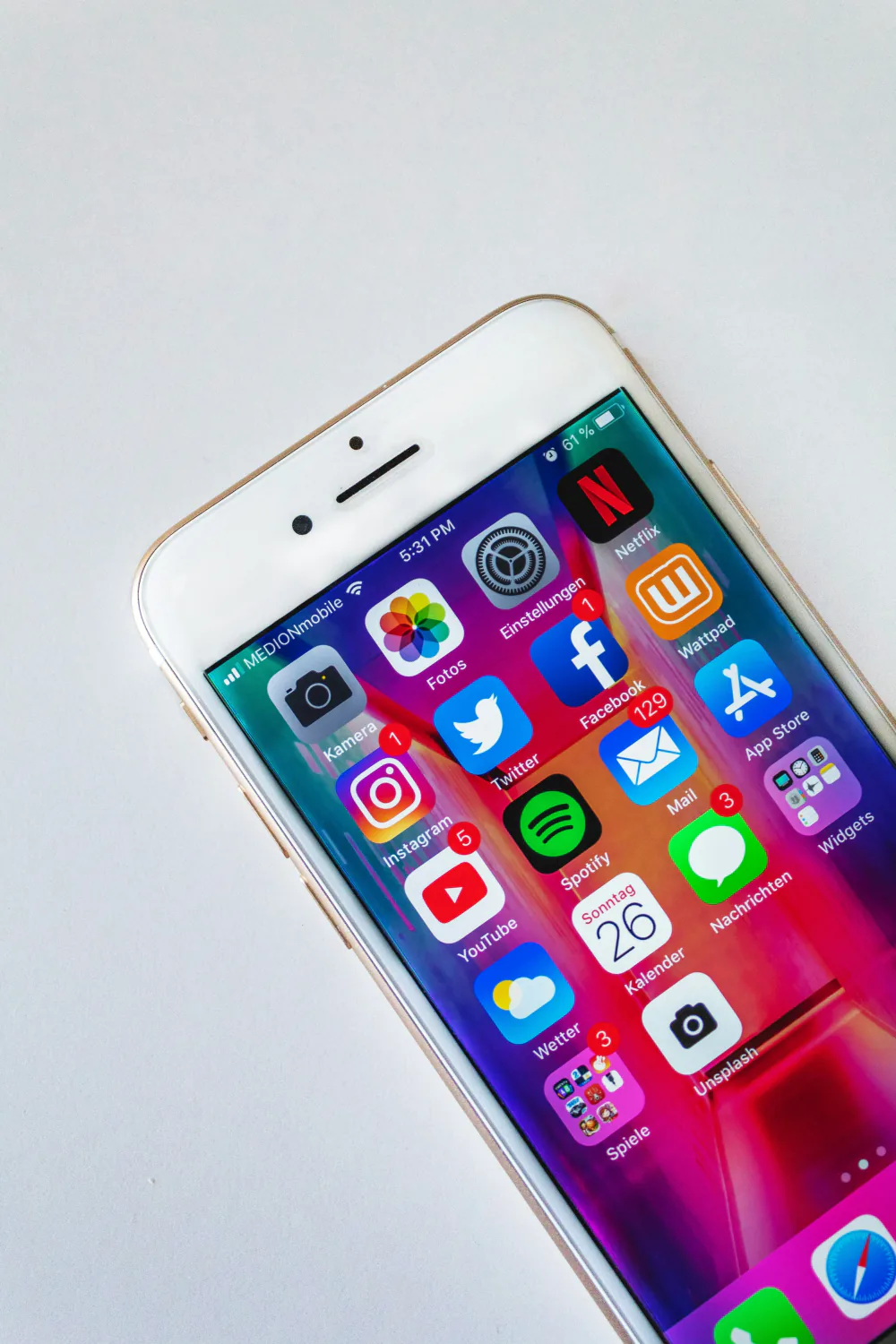 A phone home screen full of apps